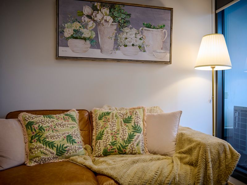 Thoughtfully selected décor adds warmth and personality to the living area.