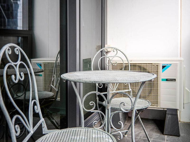 A charming bistro setting makes the balcony ideal for morning coffee or sunset drinks.