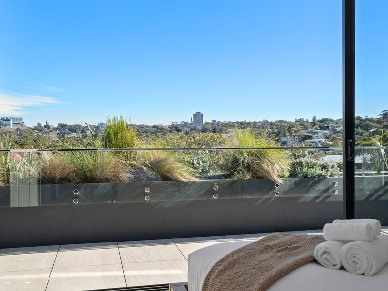 Large picture windows invite beautiful natural scenery into the home.