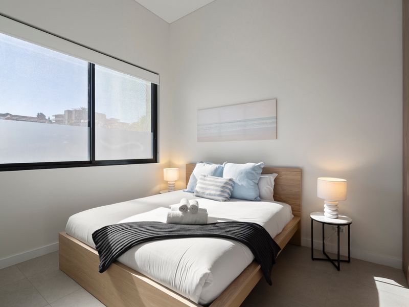 Retreat to a peaceful bedroom designed for comfort and tranquillity.