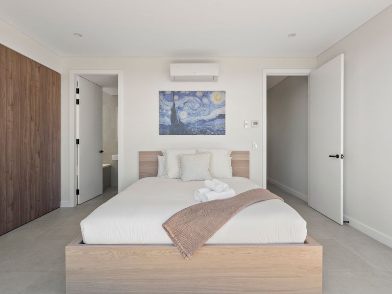 Soft neutral styling creates a welcoming environment for a relaxing stay.