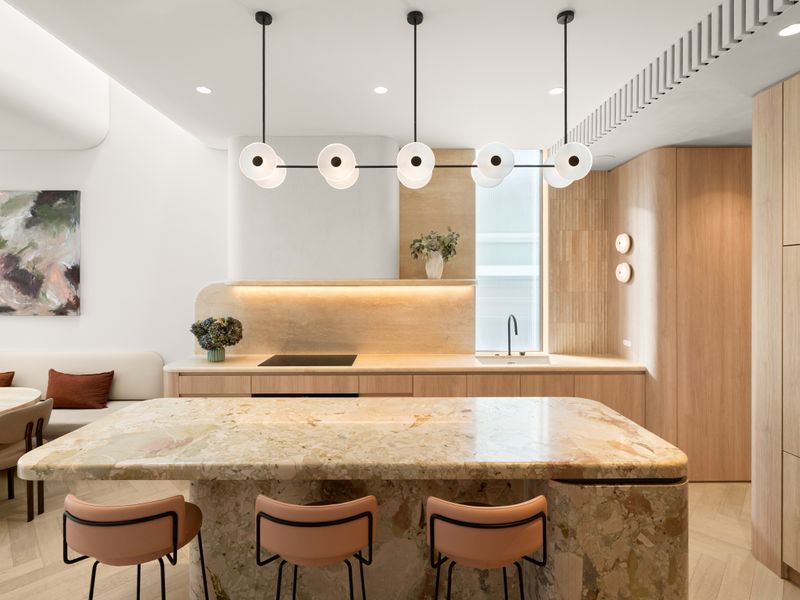 Expansive island bench ideal for cooking and casual dining.