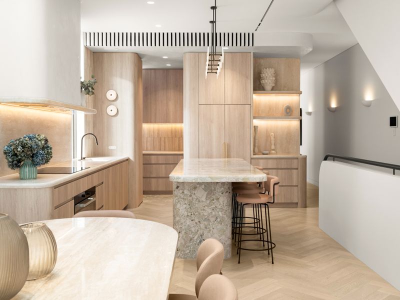Open-plan kitchen crafted with high-end finishes throughout.