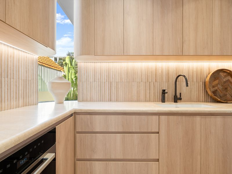 Minimalist kitchen with clean lines and quality finishes.