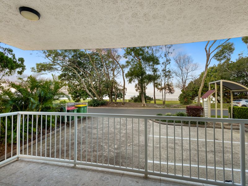 Relax and enjoy the leafy outlook to the beach