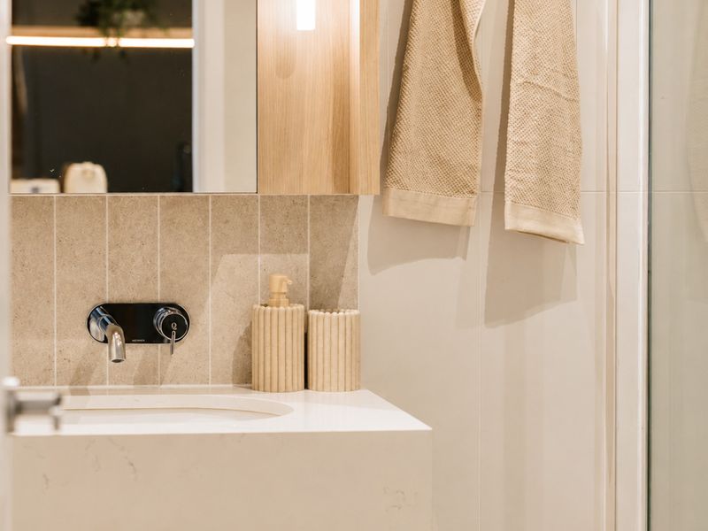 Thoughtfully appointed vanity with premium bathroom amenities.
