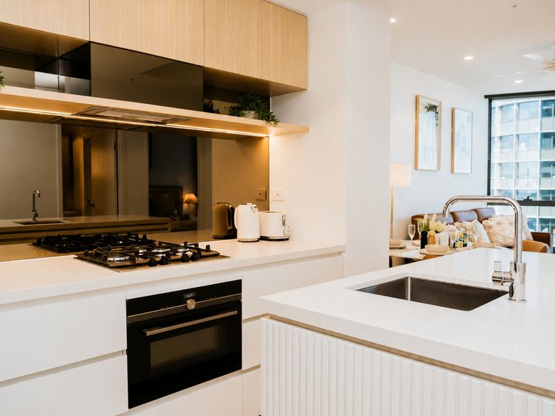 Modern kitchen with quality appliances and ample bench space.