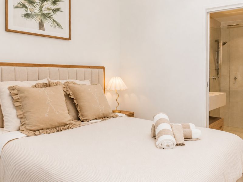 Rest easy in the peaceful bedroom with ensuite access.