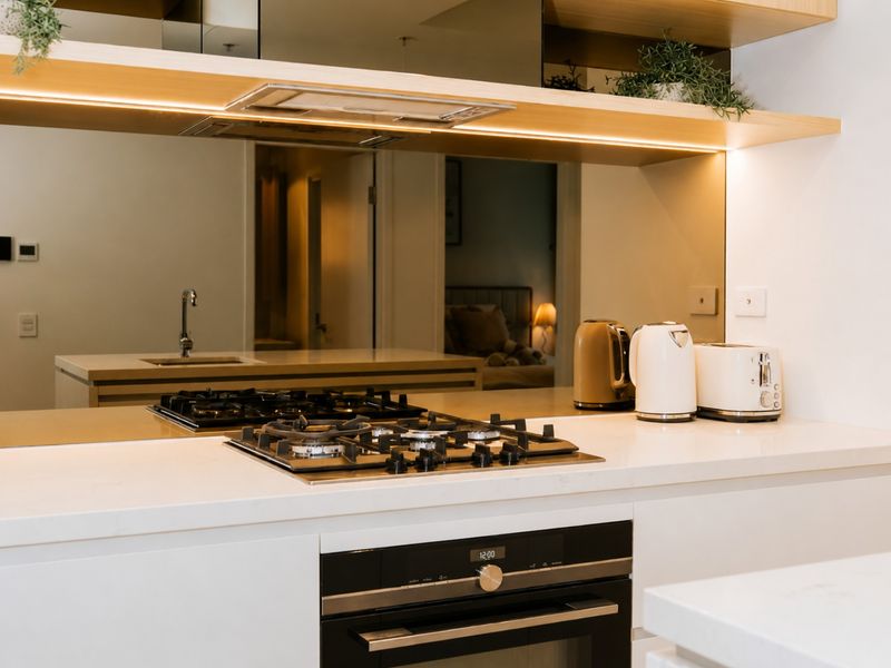 Cook with ease using the gas cooktop and modern appliances.