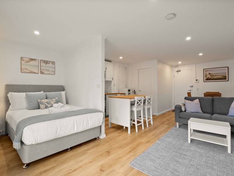 Spacious studio combining sleeping, dining and lounge spaces.