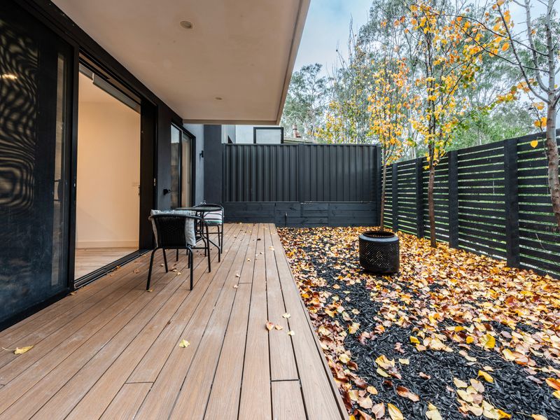 Enjoy the peaceful leafy surroundings from the spacious entertaining deck.