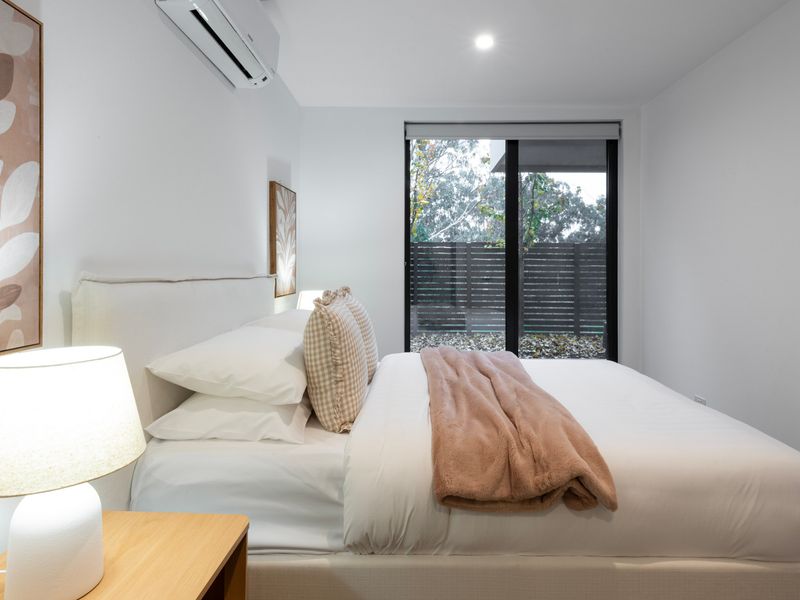 Light-filled bedroom opening onto the courtyard.