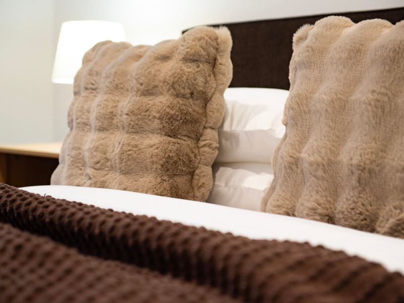 Soft furnishings and thoughtful styling throughout the home.