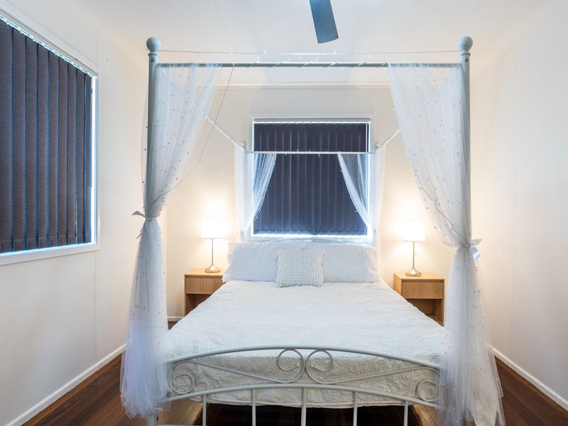 Wake up refreshed in the elegant four-poster bedroom.