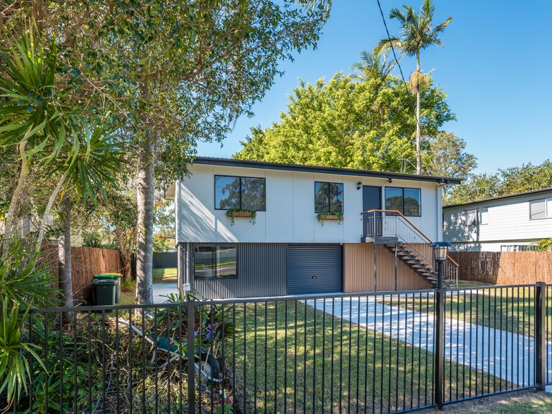Enjoy views of the home overlooking the fully fenced backyard.