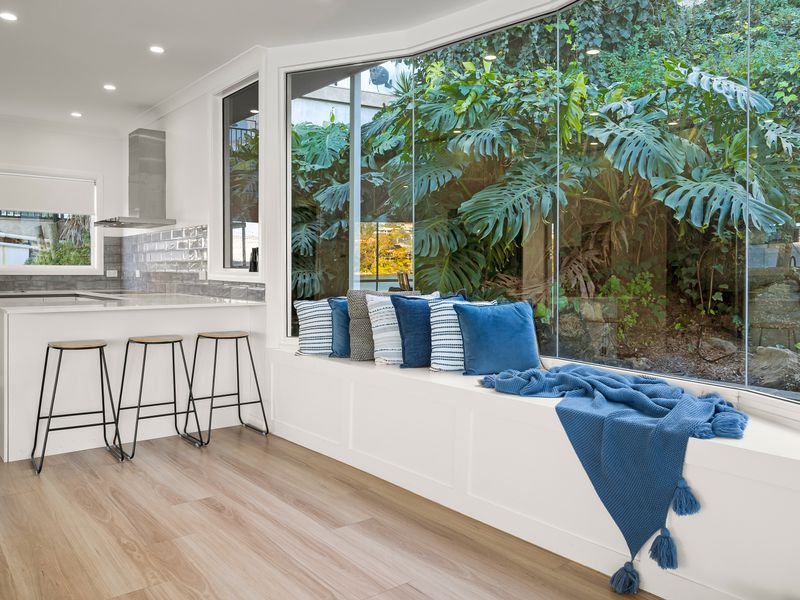Sunlit breakfast nook overlooking the garden