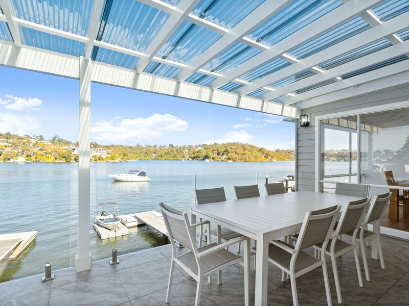 Alfresco dining with a front-row water view