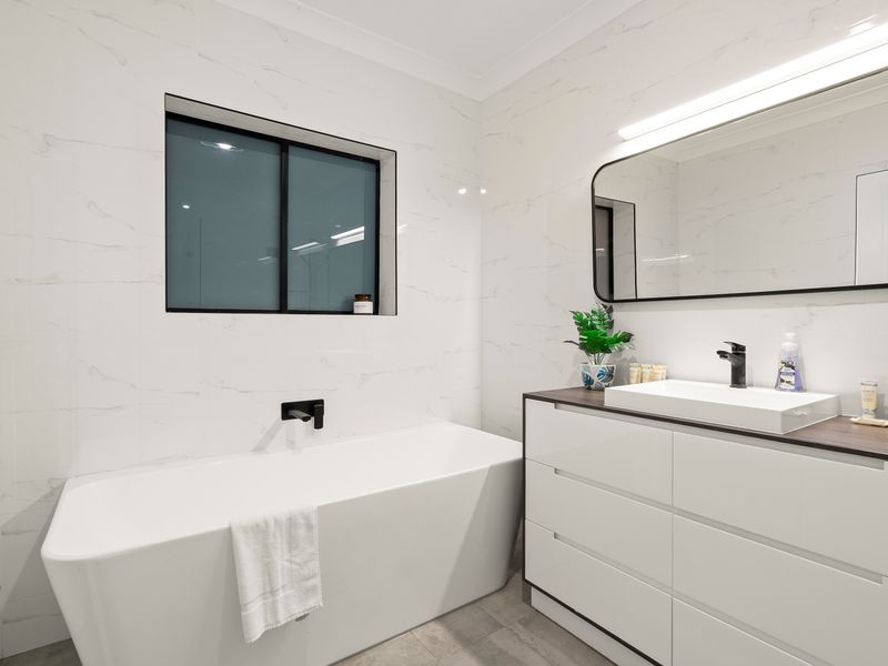 Fresh and inviting bathroom with a freestanding tub