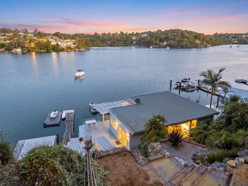 A peaceful waterfront retreat surrounded by nature