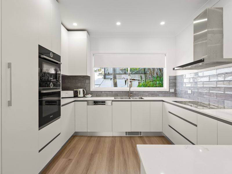 Sleek kitchen with generous preparation space