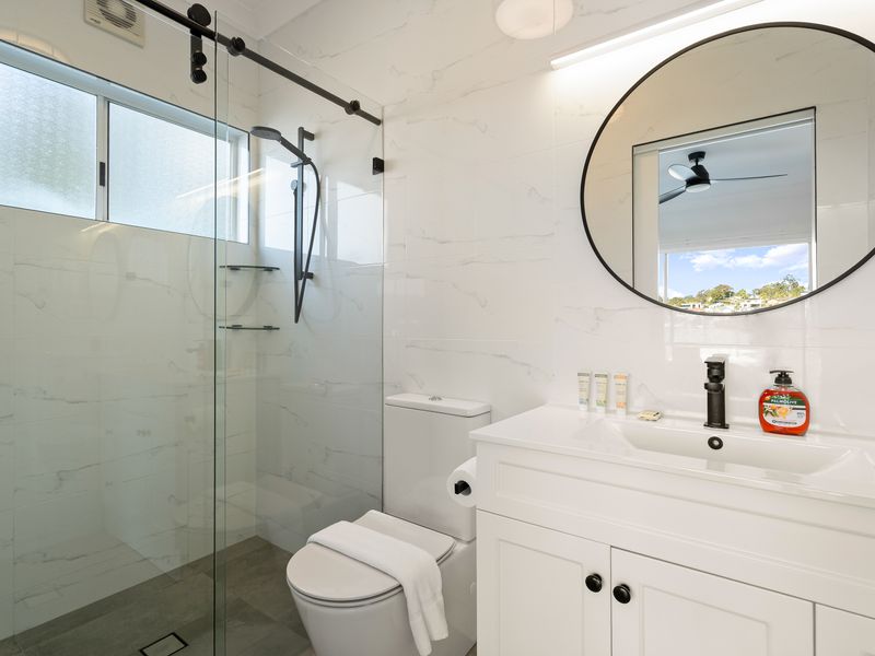 Fresh and stylish bathroom with walk-in shower