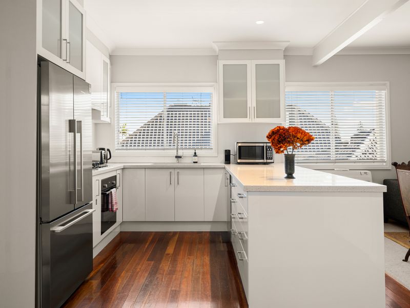 Bright and functional kitchen with plenty of storage.