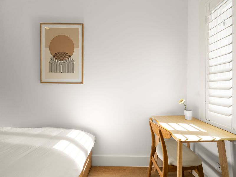A quiet bedroom retreat designed for a restful night's sleep.