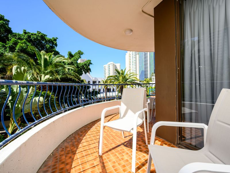 Relax outdoors with leafy views from the balcony