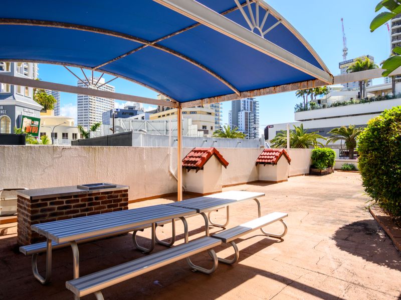Shaded outdoor area with comfortable seating