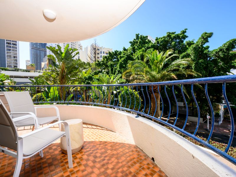 Private balcony surrounded by lush tropical greenery