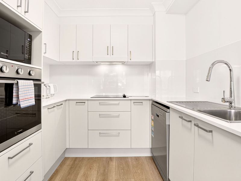 Bright and functional kitchen with ample bench space