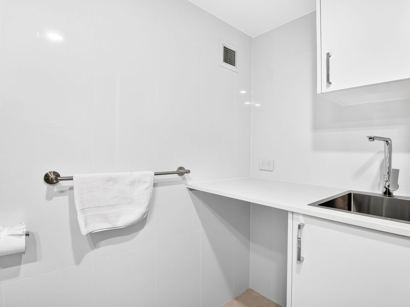 Convenient area with sink and storage.