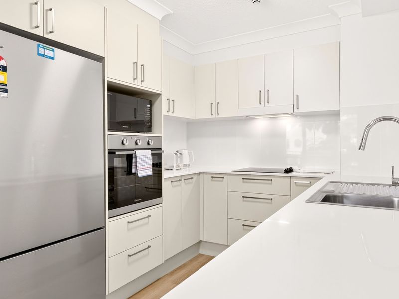 Spacious kitchen with stainless steel appliances