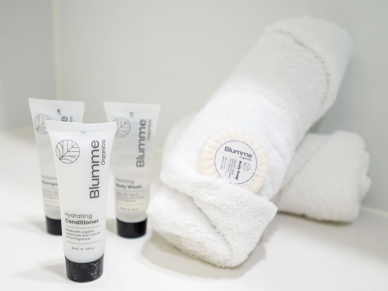 Fresh towels and complimentary bathroom amenities