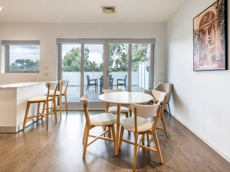 Light-filled dining area with garden views