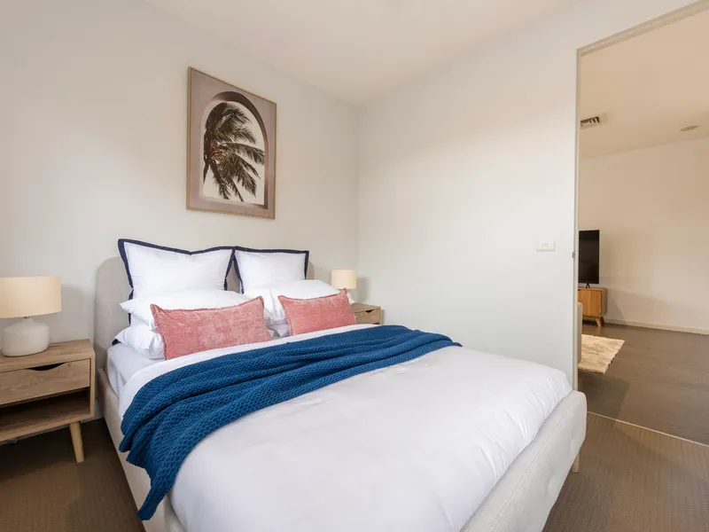 Comfortable bedroom with a touch of colour
