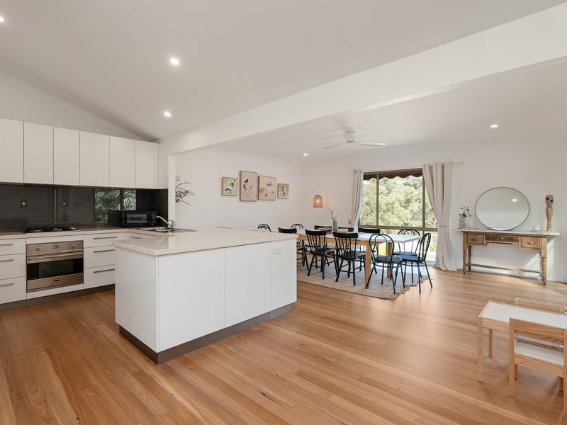 Spacious open-plan kitchen and dining area designed for easy group stays