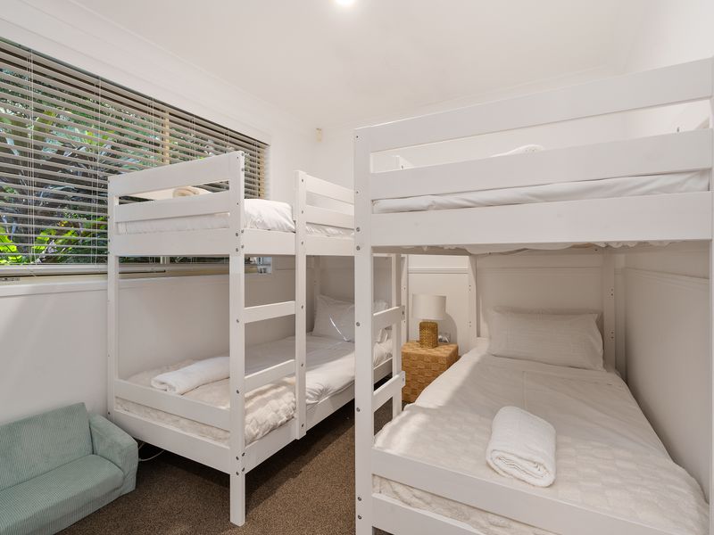 Bunk room with four single beds – perfect for families and groups