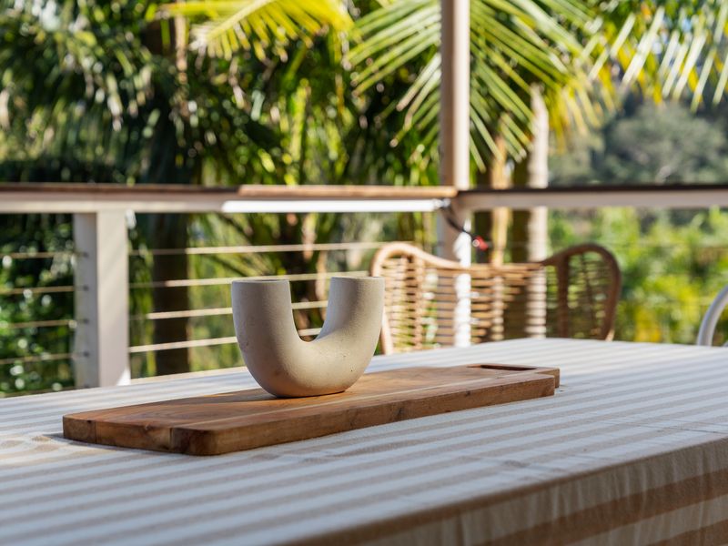 Thoughtful outdoor details complement the home’s tranquil setting