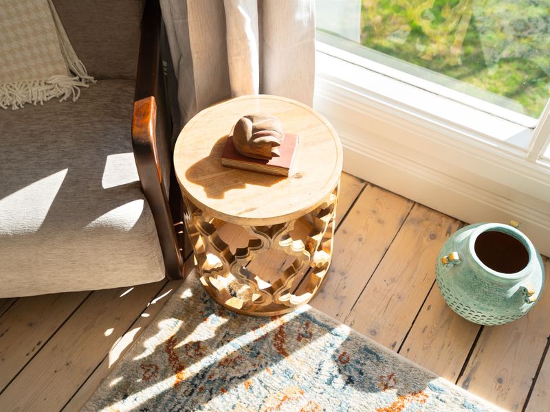 Warm timber floors and sunlit details create a welcoming feel