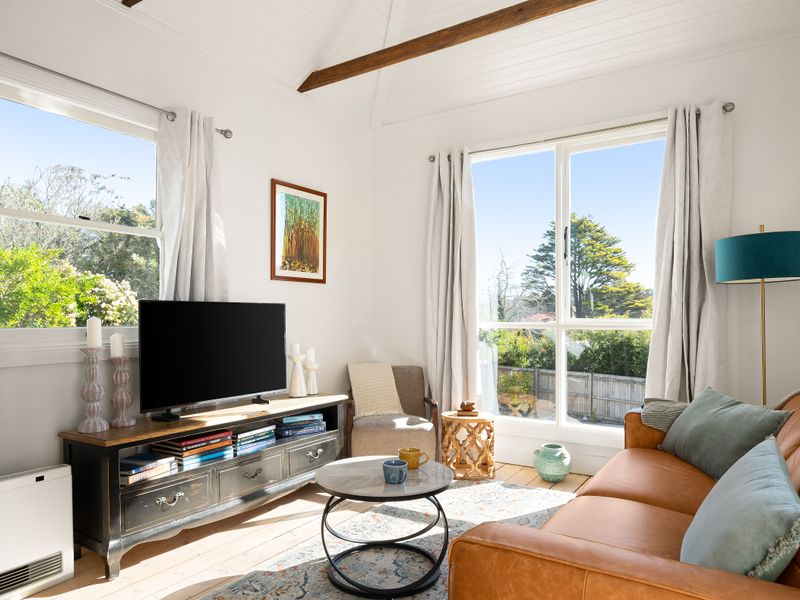 Light-filled lounge with garden views and comfortable seating