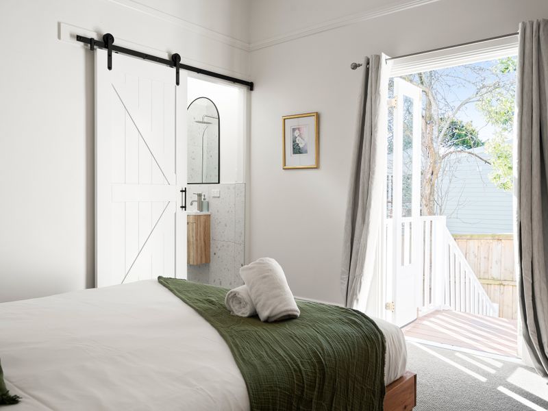 Peaceful bedroom opening onto a private outdoor area