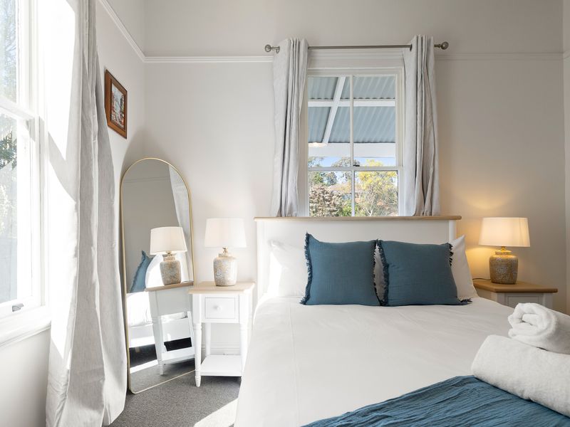 Light-filled bedroom with a relaxed country feel