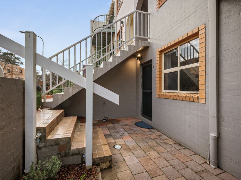 Exterior view of the building stairs and walkway.