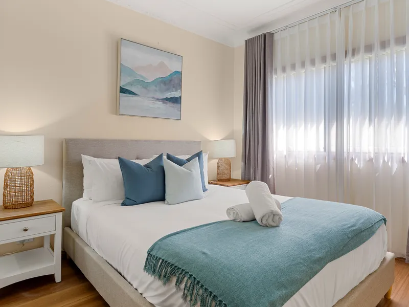Queen bed provide a relaxing space to unwind and enjoy a restful night's sleep.