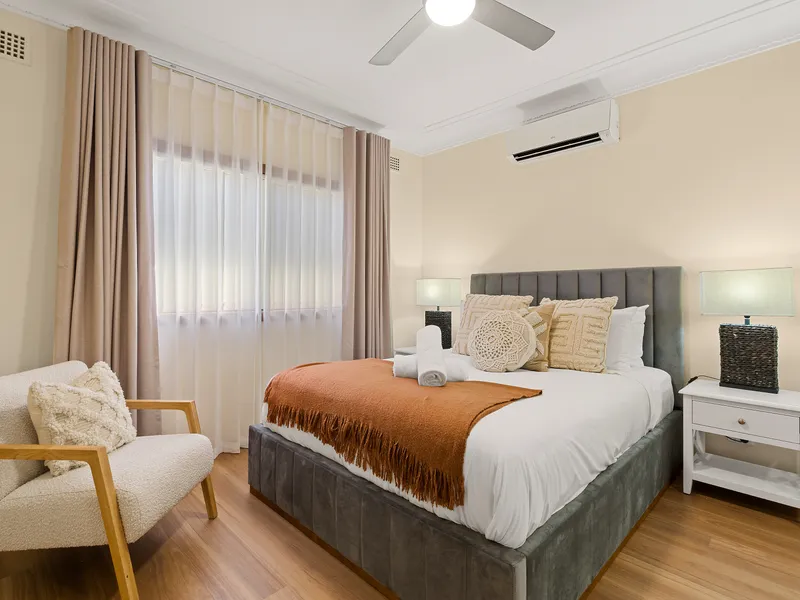 Queen bed provide a relaxing space to unwind and enjoy a restful night's sleep. with Split Air Con