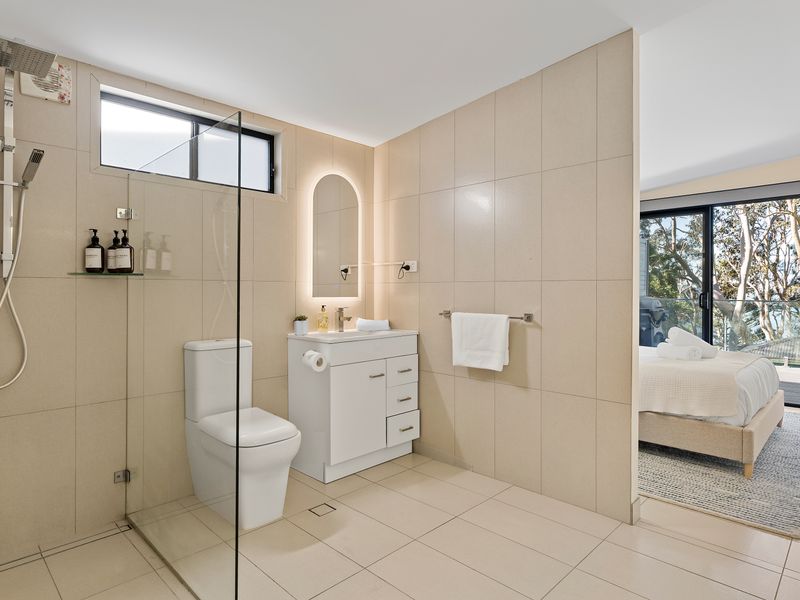 A clean and comfortable bathroom with the essentials you need for a relaxing and convenient stay.