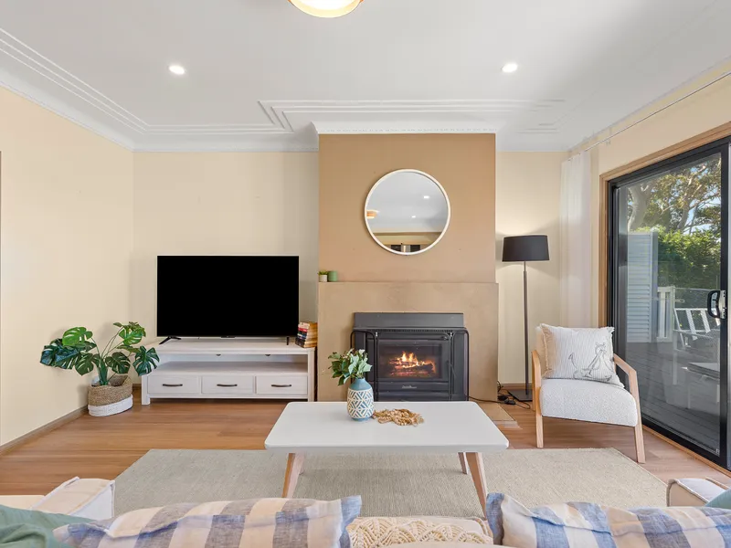 Relax in the comfortable lounge room, the perfect spot to unwind, gather with family and friends, and enjoy the peaceful surroundings.