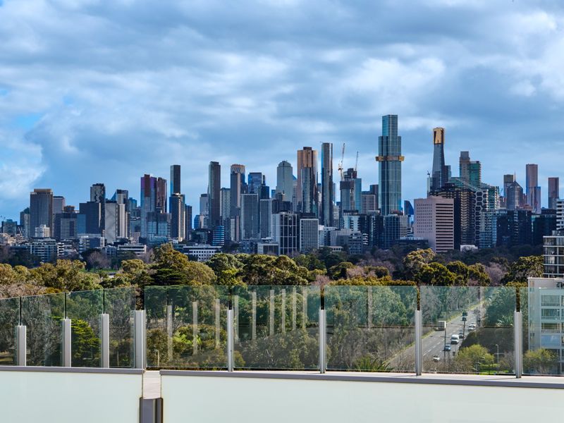 Iconic Melbourne skyline stretching across the horizon.