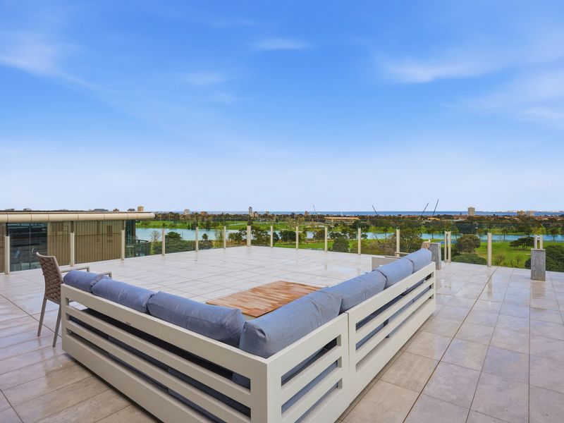 Expansive rooftop terrace with outdoor seating and wide open views.
